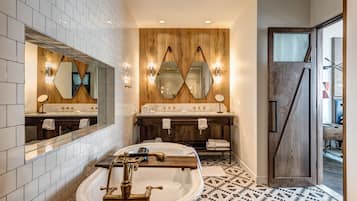 Designer toiletries, hair dryer, bathrobes, slippers