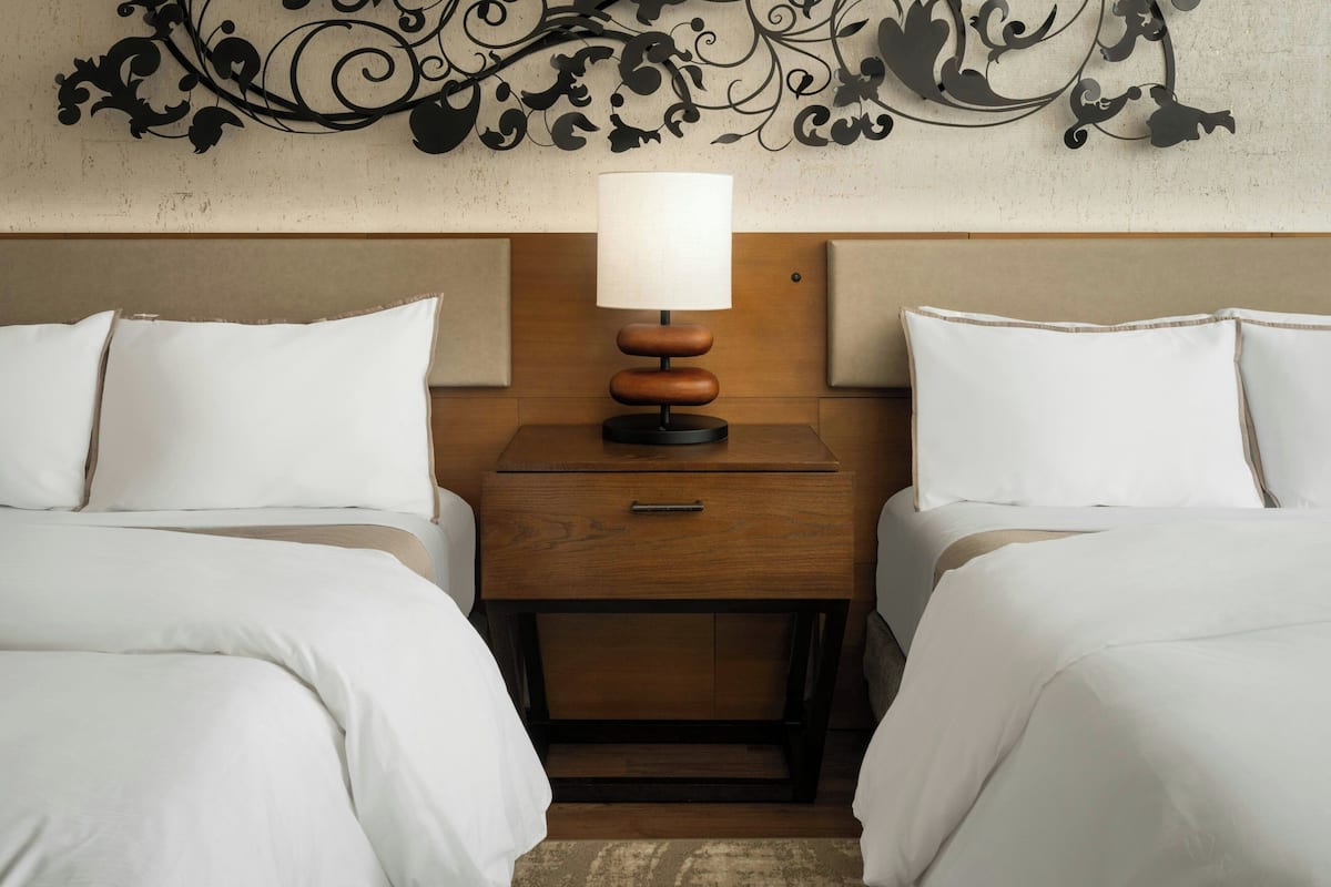 Premium bedding, down duvets, pillow-top beds, in-room safe