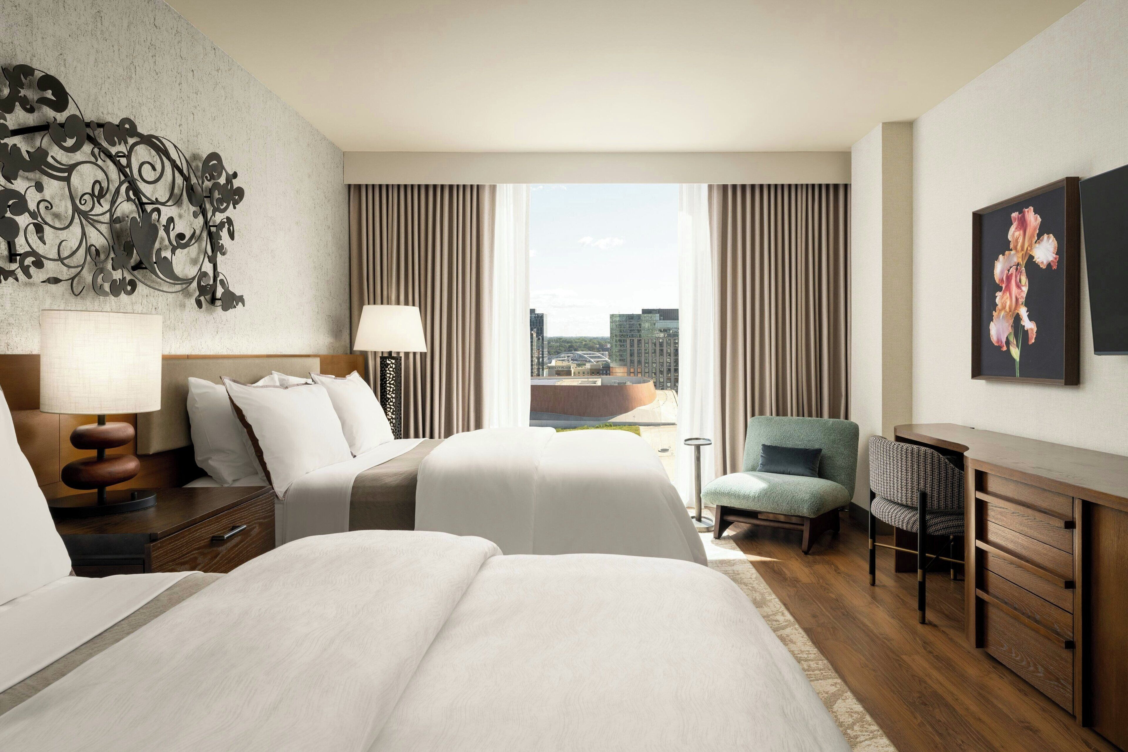 Premium bedding, down comforters, pillowtop beds, in-room safe