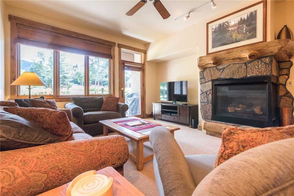 Condo, Multiple Beds (3106 Champagne Lodge, Trappeur's Cros) | Living room | TV, fireplace