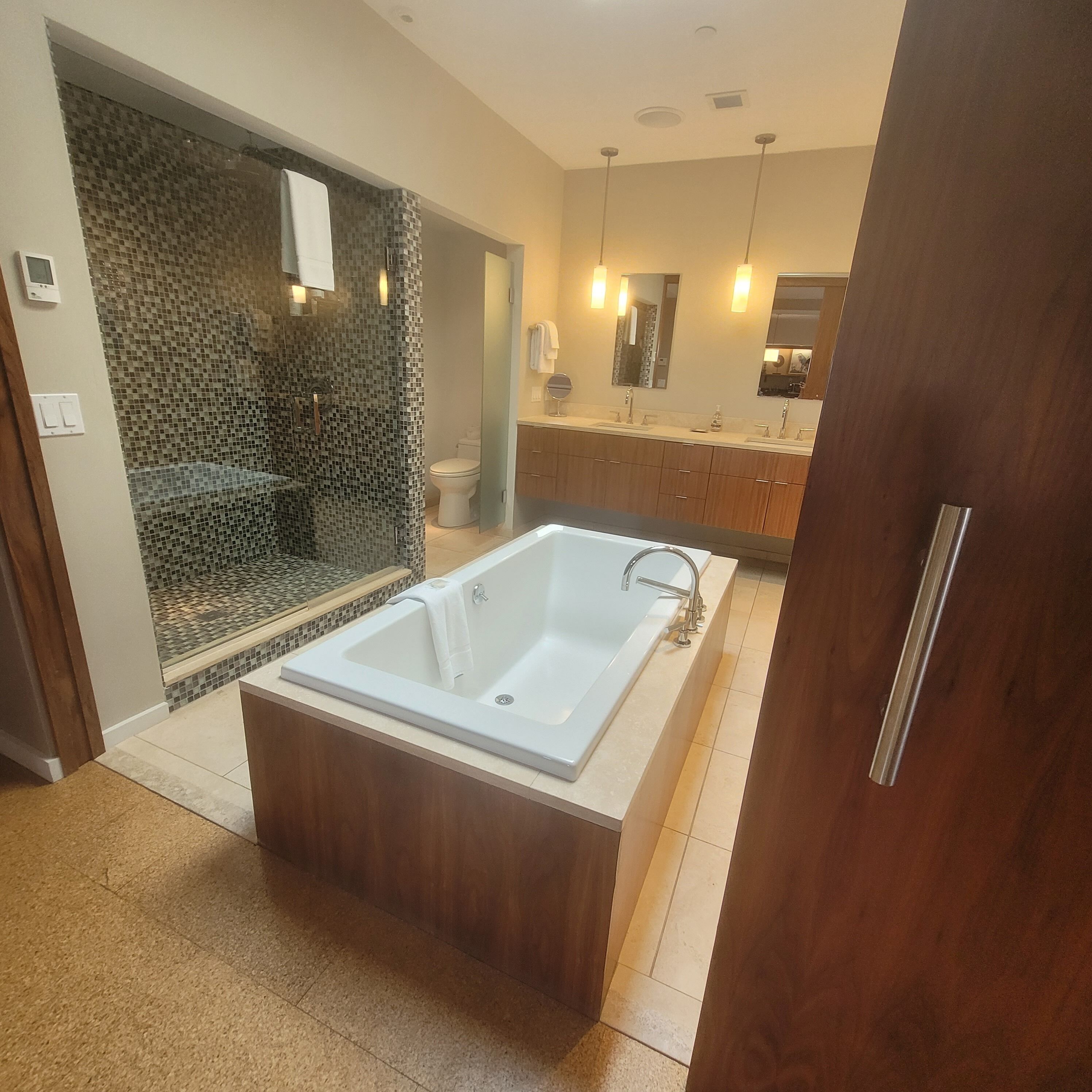 studio suite, 1 king bed, ocean view | bathroom | hair dryer, heated floors, towels