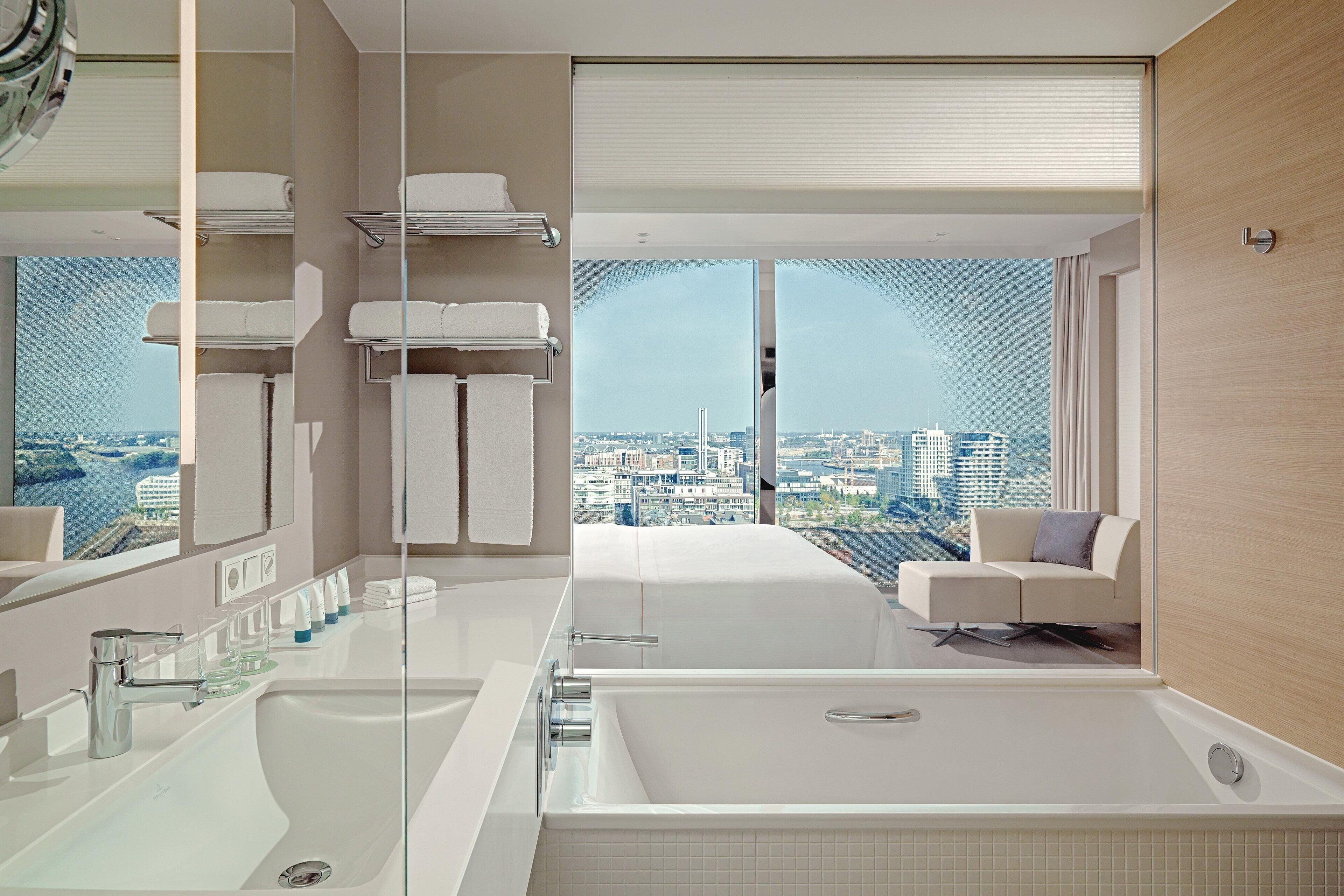 deluxe room, 1 king bed, city view | bathroom | separate bathtub and shower, rainfall showerhead, free toiletries