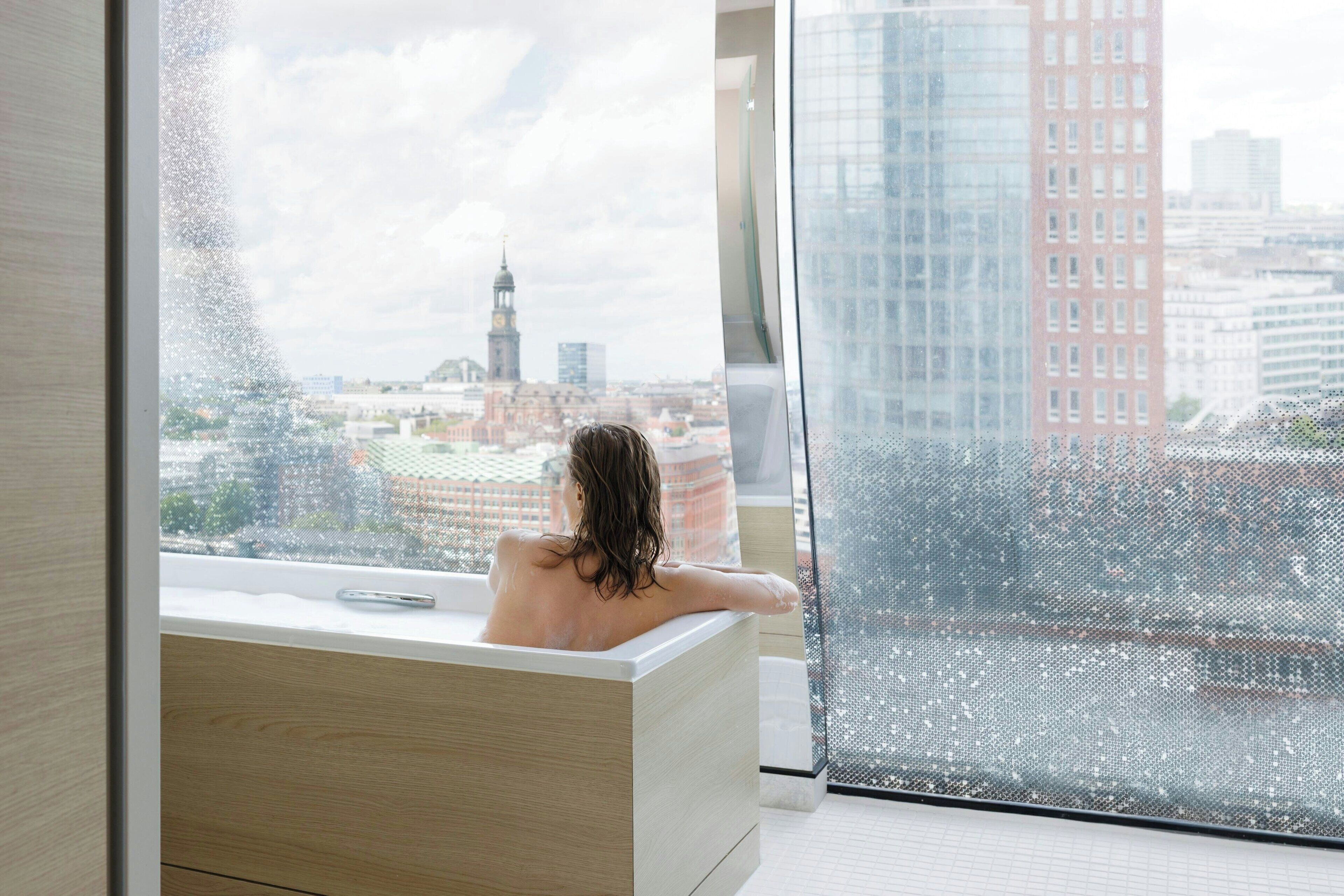 Separate bathtub and shower, rainfall showerhead, free toiletries