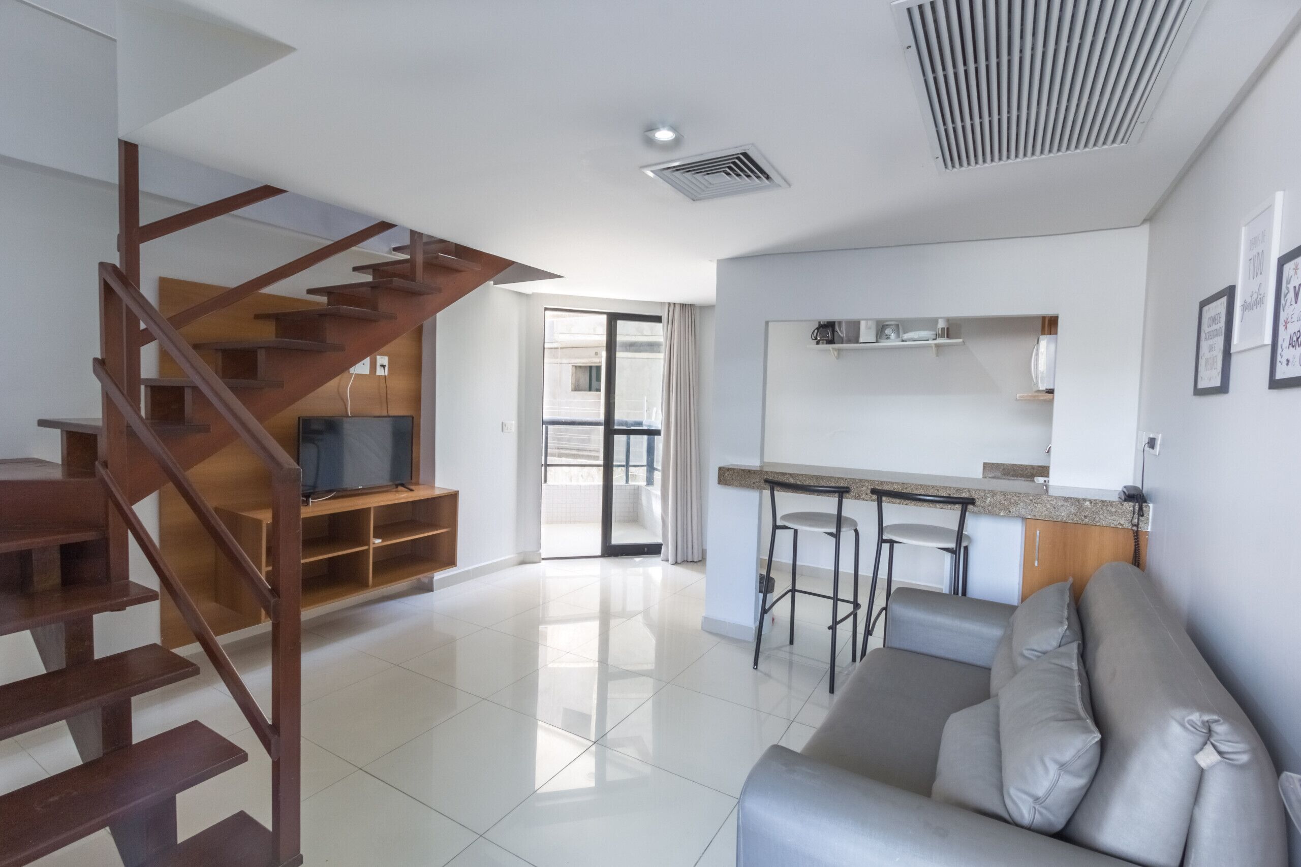 Grand Studio Suite, 1 Bedroom | Living area | 32-inch flat-screen TV with cable channels, TV