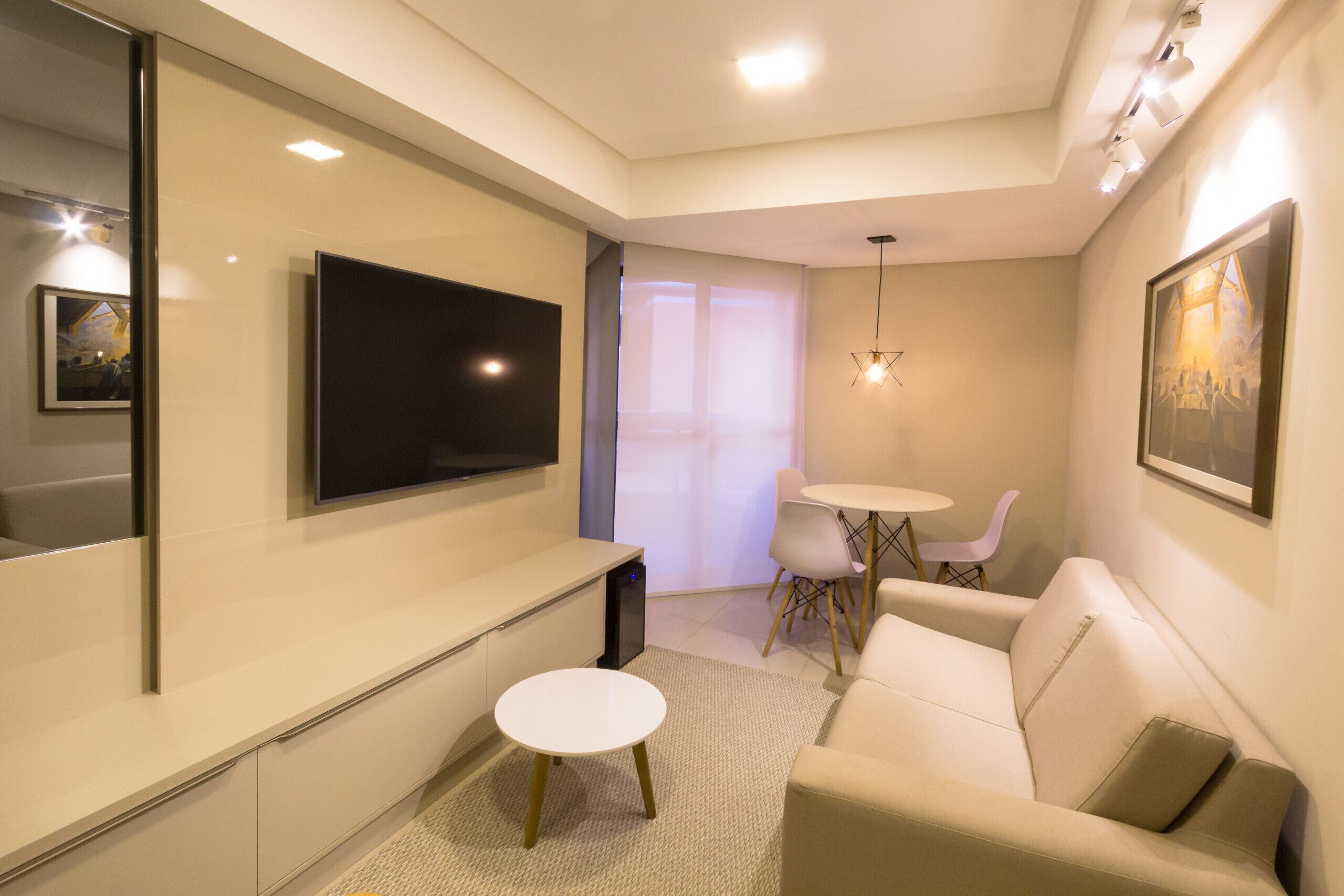 Luxury Studio Suite, 1 Bedroom, Lanai | Living area | 32-inch flat-screen TV with cable channels, TV