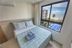 Exclusive Apartment, 2 Bedrooms, Sea View, Beachfront | 2 bedrooms, blackout curtains, soundproofing, free WiFi