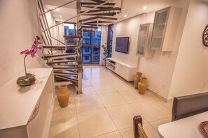 Panoramic Penthouse, 2 Bedrooms, Sea View, Beachfront | Living room | TV - Luxor Paulo Miranda Home Service (João Pessoa)