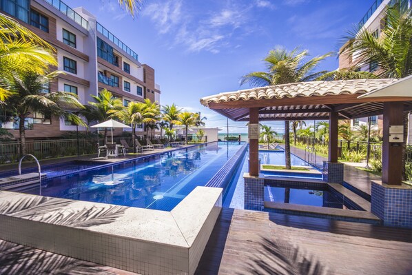 Outdoor pool, pool umbrellas, pool loungers