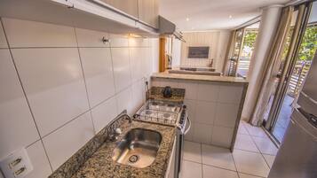 Premium Apartment, 2 Bedrooms, Sea View, Beachfront | Private kitchenette | Fridge, microwave, stovetop, cookware/dishes/utensils