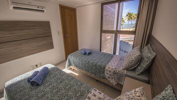 Luxury Apartment, 2 Bedrooms, Sea View, Beachfront | 2 bedrooms, blackout drapes, iron/ironing board, free WiFi