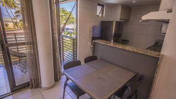 Premium Apartment, 2 Bedrooms, Sea View, Beachfront | Private kitchenette | Fridge, microwave, stovetop, cookware/dishes/utensils