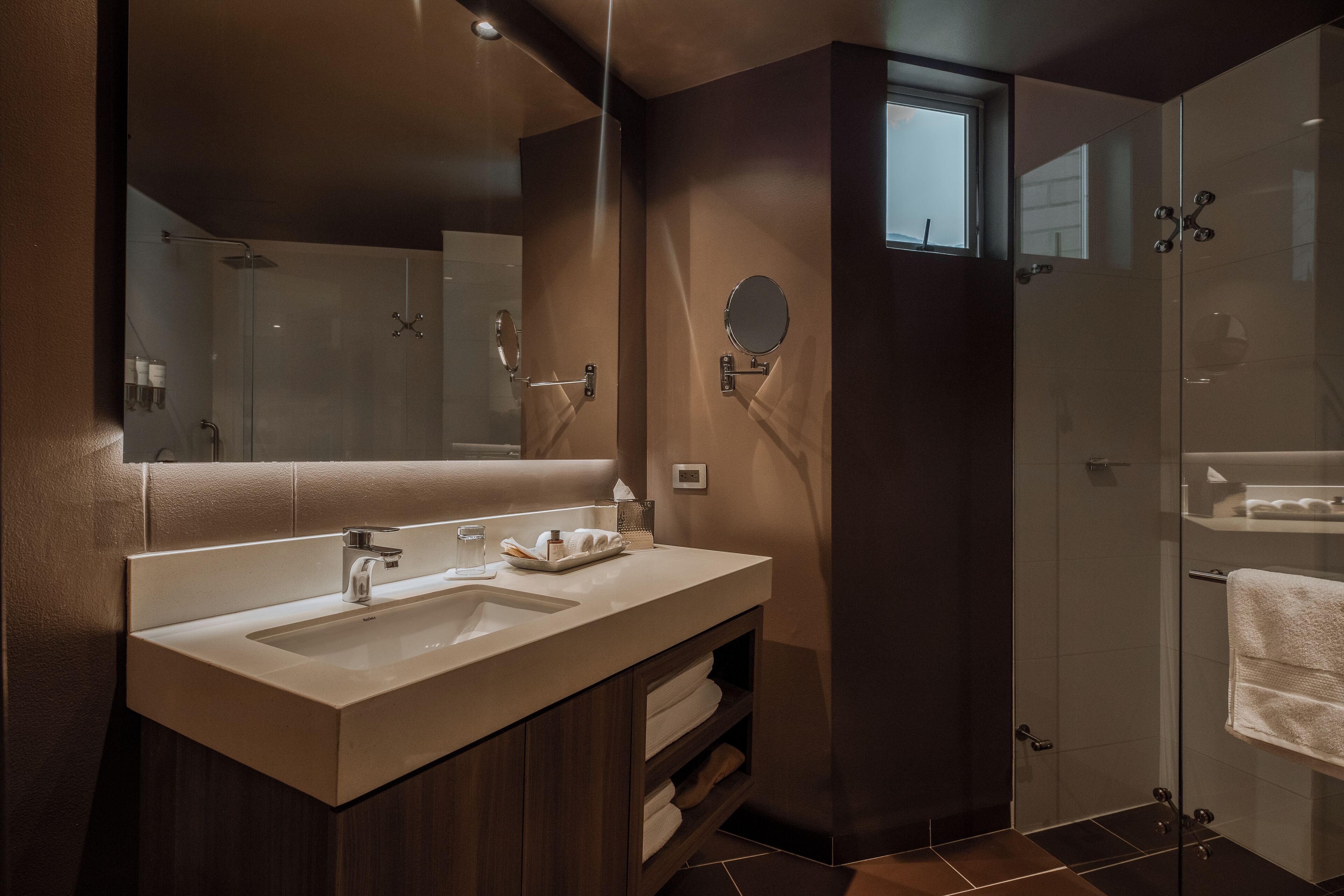 superior twin room | bathroom | designer toiletries, hair dryer, towels, soap