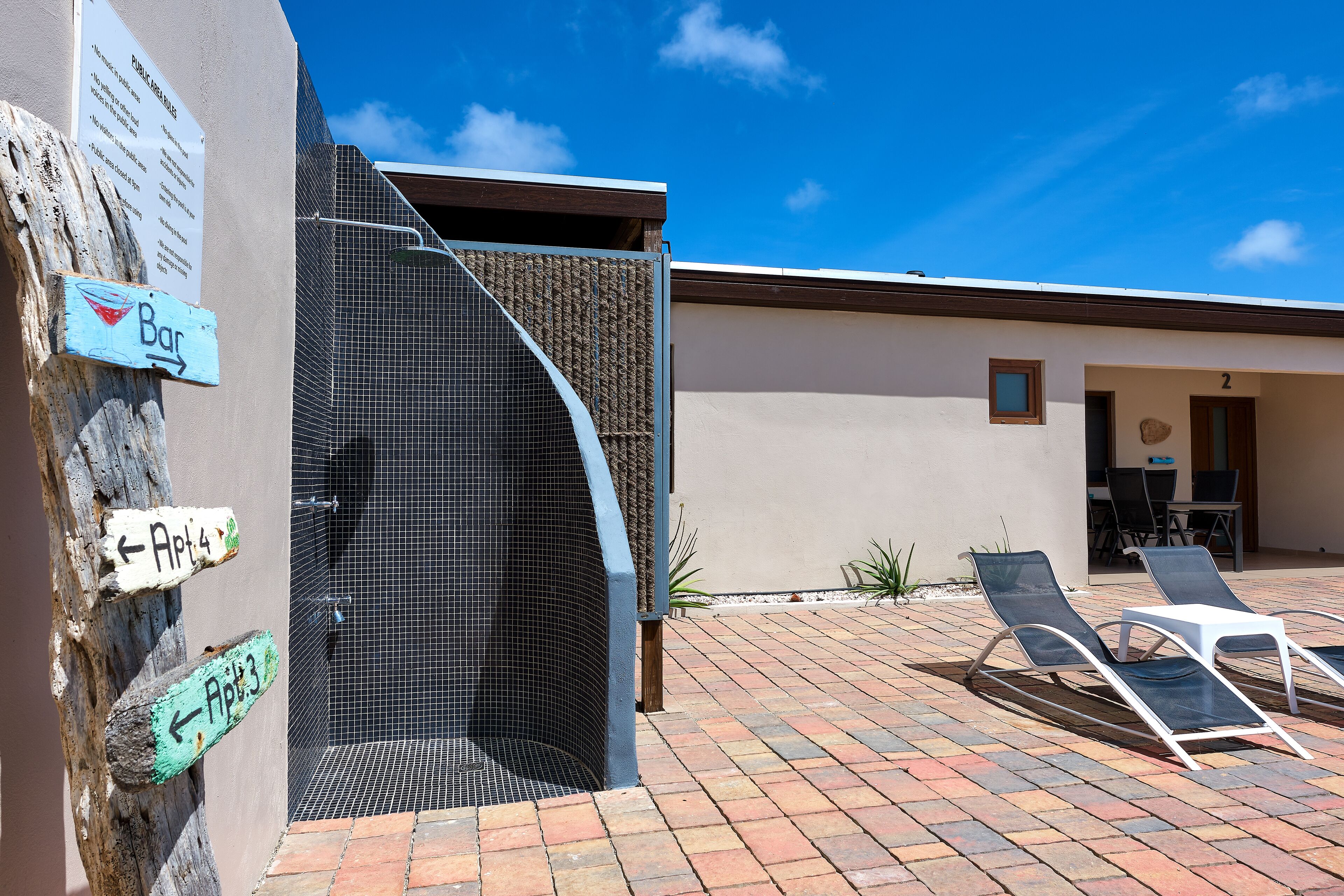 Outdoor pool, pool umbrellas, sun loungers