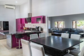 Deluxe Villa | Living area | Flat-screen TV