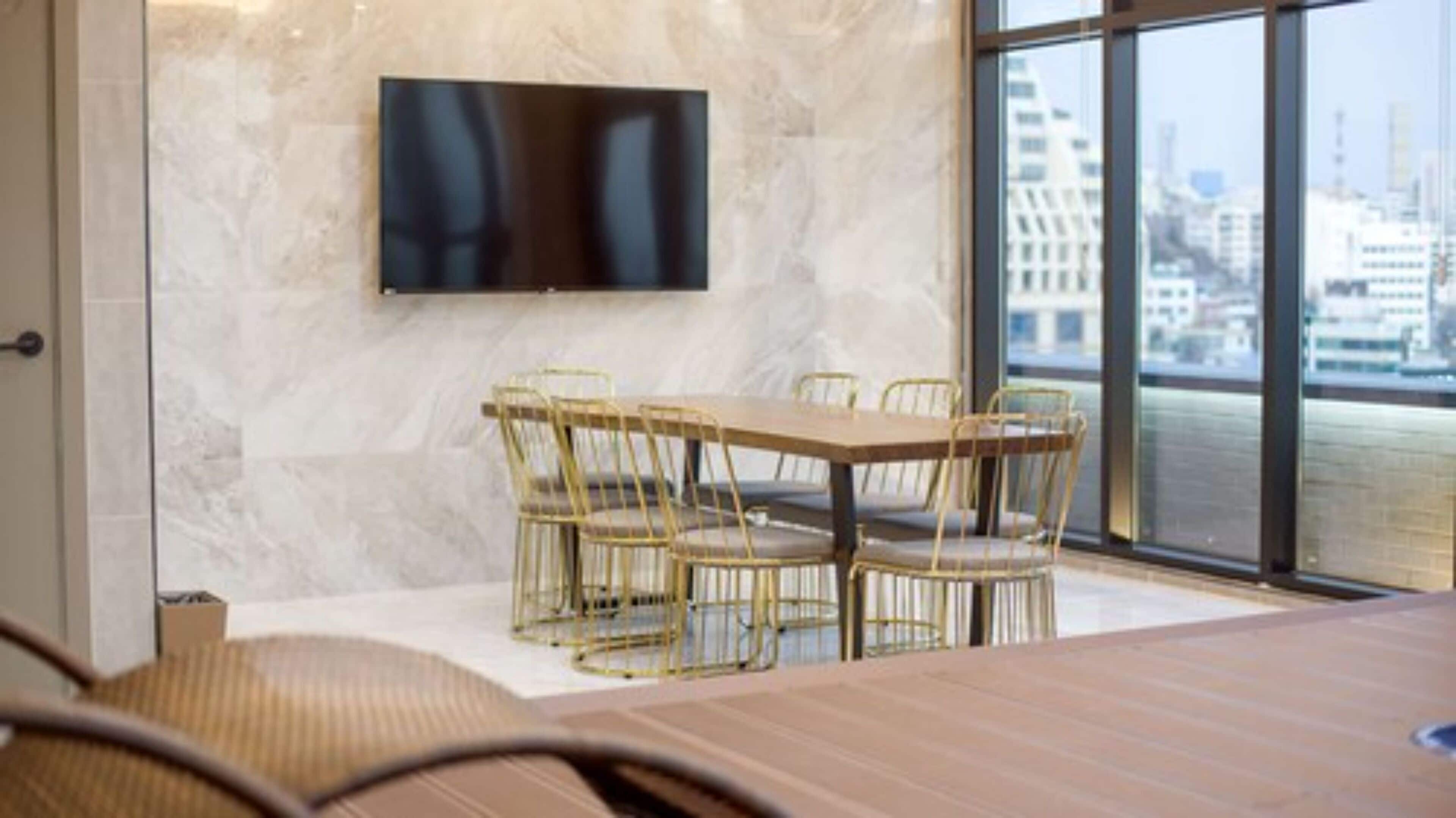 penthouse | living area | flat-screen tv