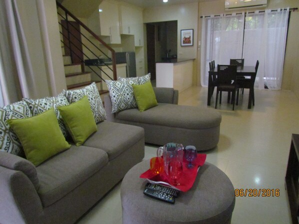 Family Apartment, 3 Bedrooms, Garden Area | Living room | TV - Marina Residences (Dumaguete)