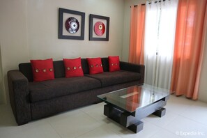 Family Apartment, 3 Bedrooms, Garden Area | Living area | TV - Marina Residences (Dumaguete)