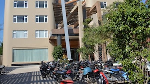 A modern building with a unique angular design, featuring a Best Western logo. - Eastern Palace Hotel (Mandalay)