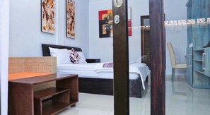 Quarto standard, 1 cama de casal | Frigobar, cofres nos quartos, escrivaninha, Wi-Fi de cortesia