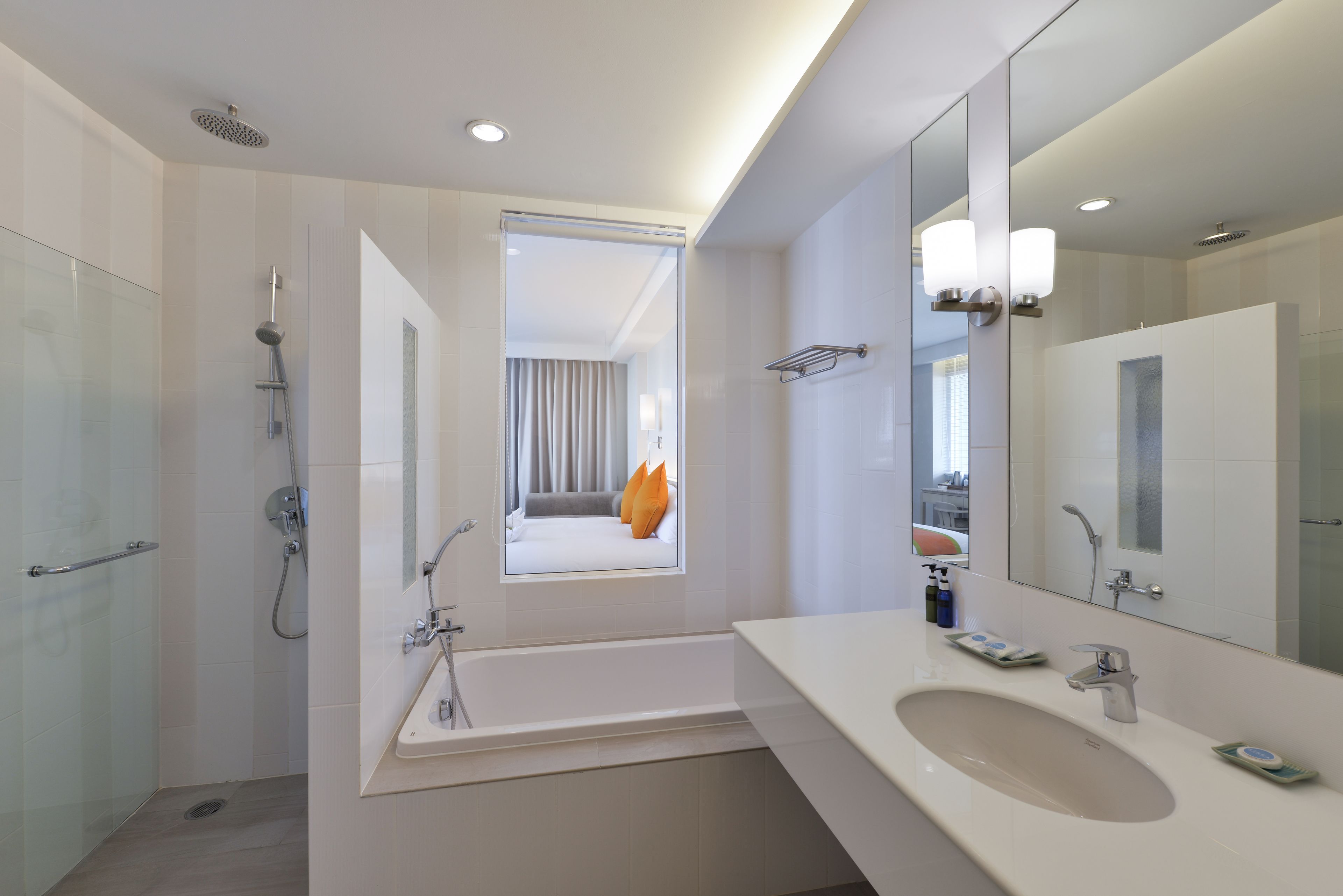 separate bathtub and shower, deep-soaking bathtub, rainfall showerhead