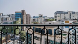 A cityscape with modern buildings, including a mix of residential and commercial structures. - Nohyung Hotel (Jeju City)