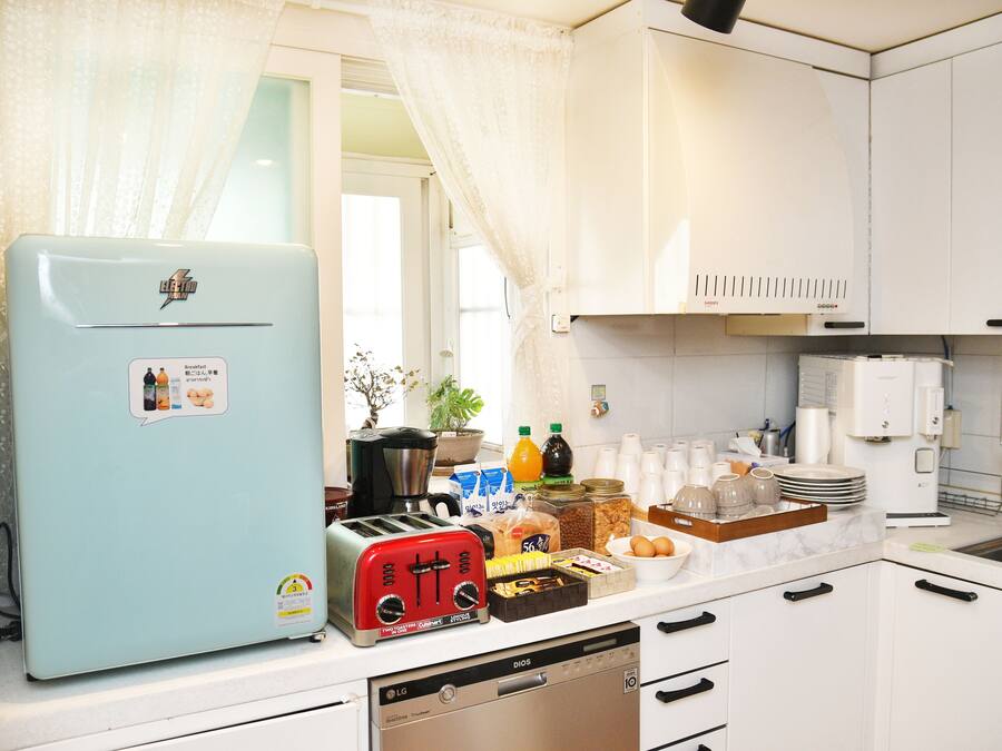 Mini-fridge, microwave, toaster, cookware/dishes/utensils