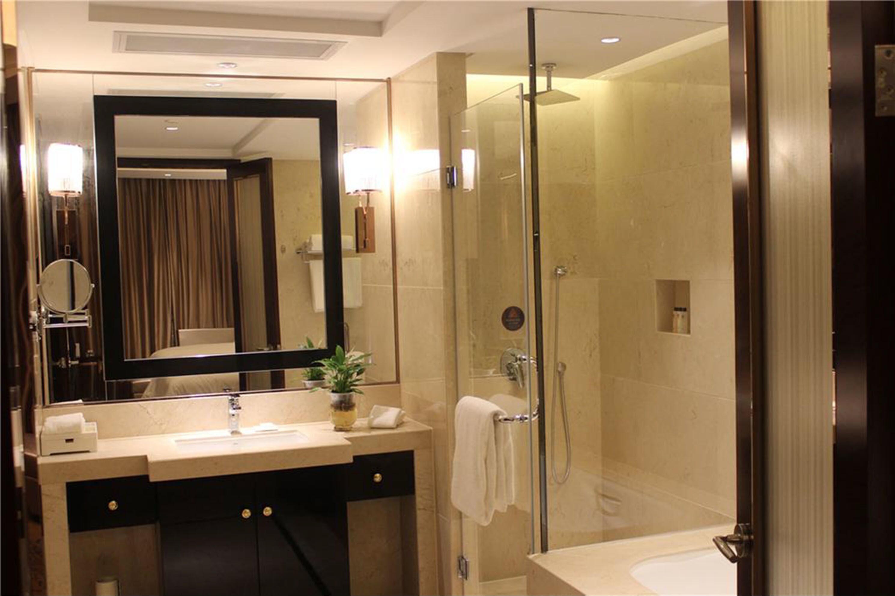 separate bathtub and shower, free toiletries, bathrobes, slippers