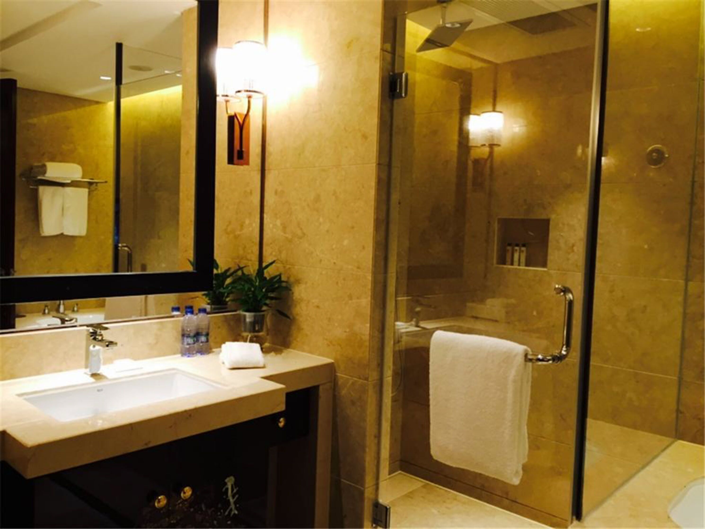 separate bathtub and shower, free toiletries, bathrobes, slippers