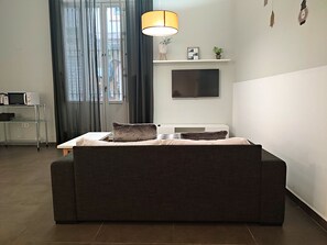 Apartment, 1 Bedroom, Ground Floor | Living area | 32-inch flat-screen TV with digital channels, TV - Flats Friends Soho Suites (Valencia)