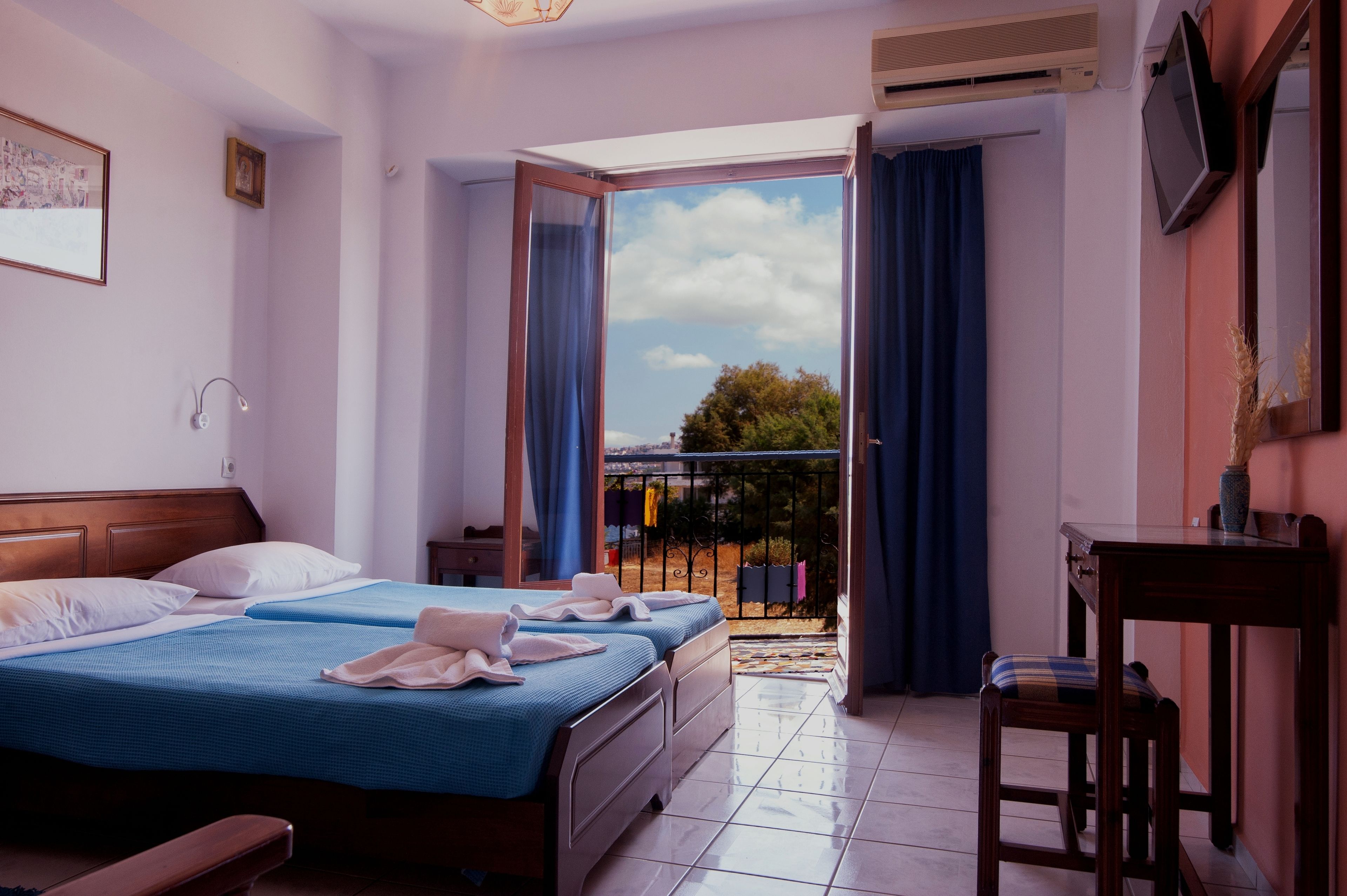 triple room, sea view | 1 bedroom, in-room safe, desk, laptop workspace