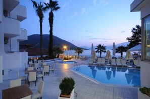 Outdoor pool, pool umbrellas, pool loungers