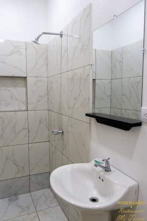 Standard Triple Room | Bathroom | Shower, towels