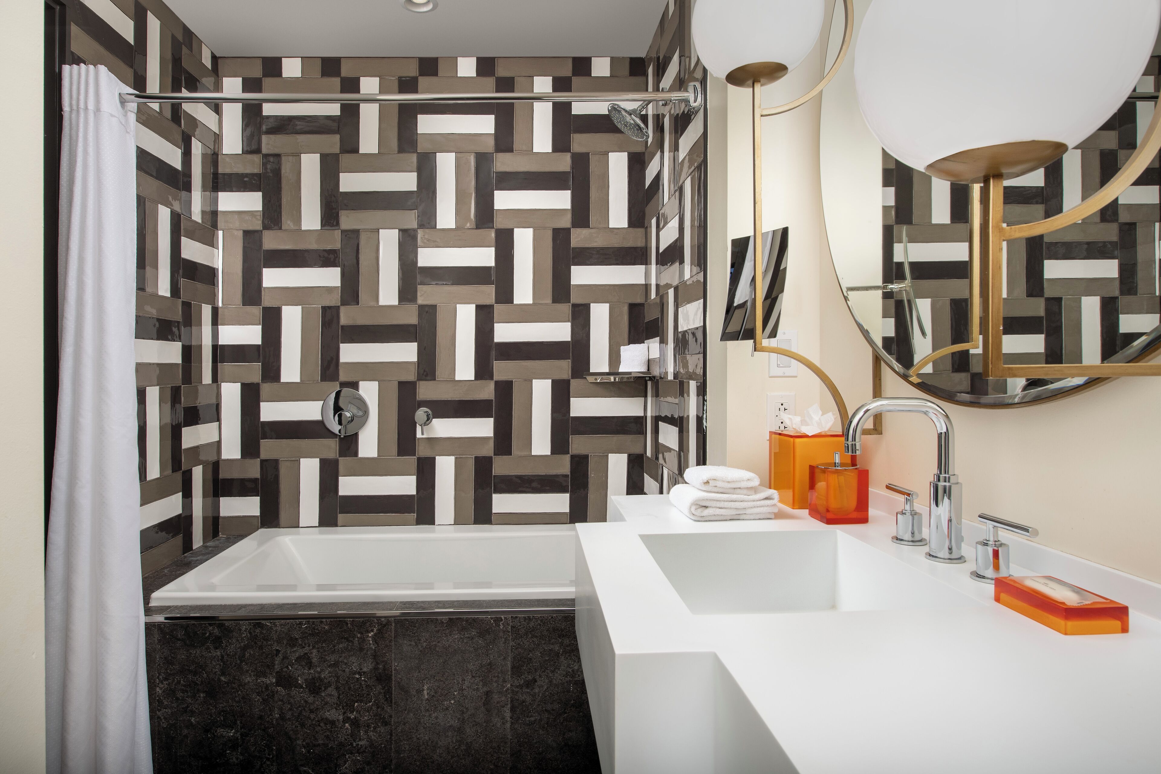 shower, deep-soaking bathtub, rainfall showerhead, designer toiletries