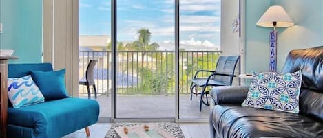 Condo, 2 Bedrooms, Balcony, Ocean View (Hamilton House 206) | Living area | Flat-screen TV, DVD player