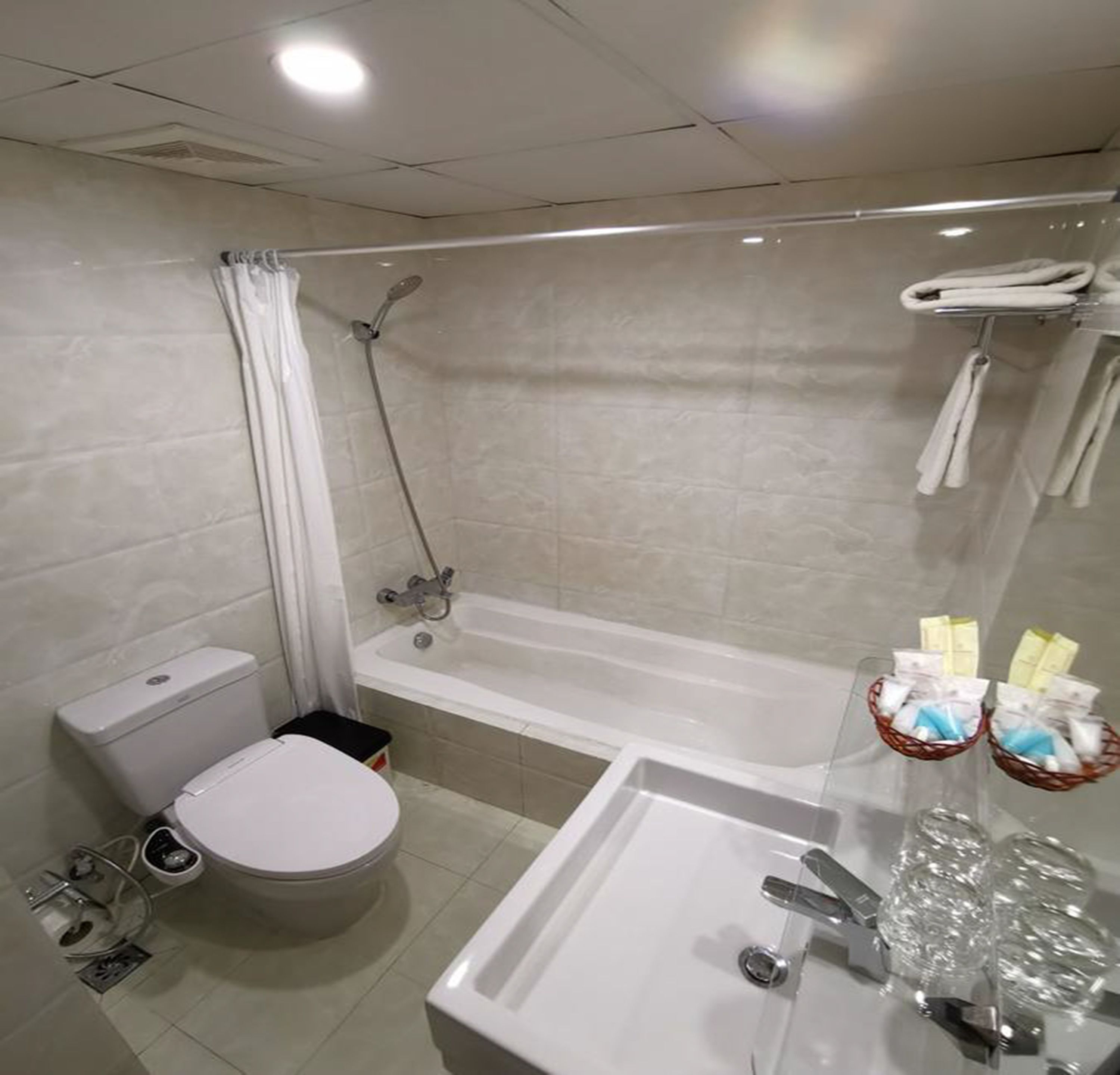 shower, free toiletries, hair dryer, slippers