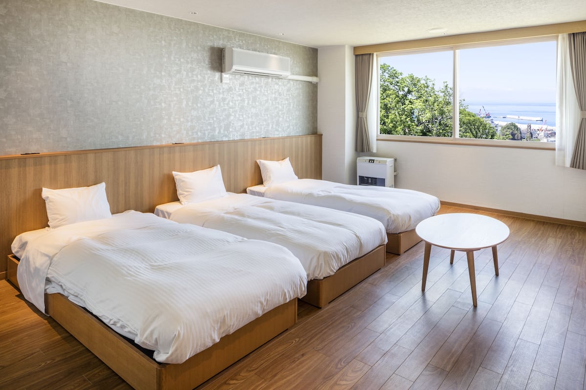 Basic Triple Room, 3 Twin Beds, Non Smoking | In-room safe, free WiFi