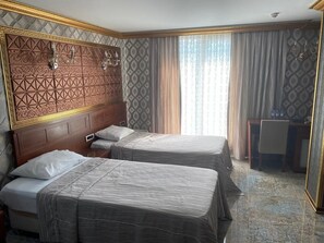 Premium bedding, minibar, in-room safe, desk
