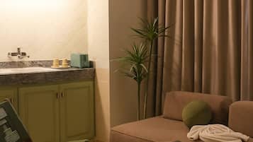 Apartemen Ekonomi, 1 kamar tidur | Area keluarga | Televisi layar datar 40-inci dengan saluran TV satelit