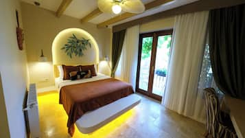 Superior Double Room, Partial Sea View | Minibar, in-room safe, desk, soundproofing