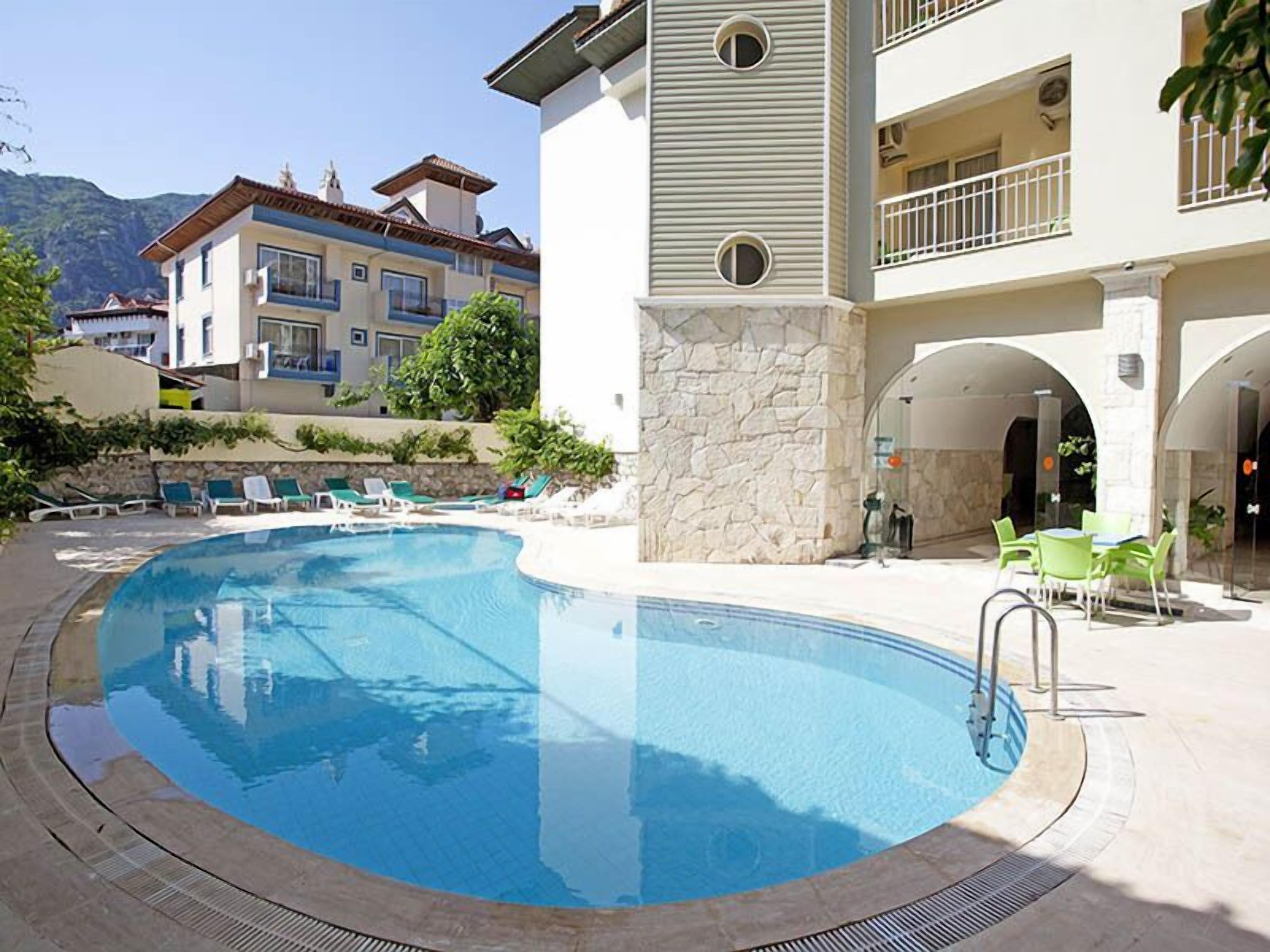 Outdoor pool, pool umbrellas, pool loungers