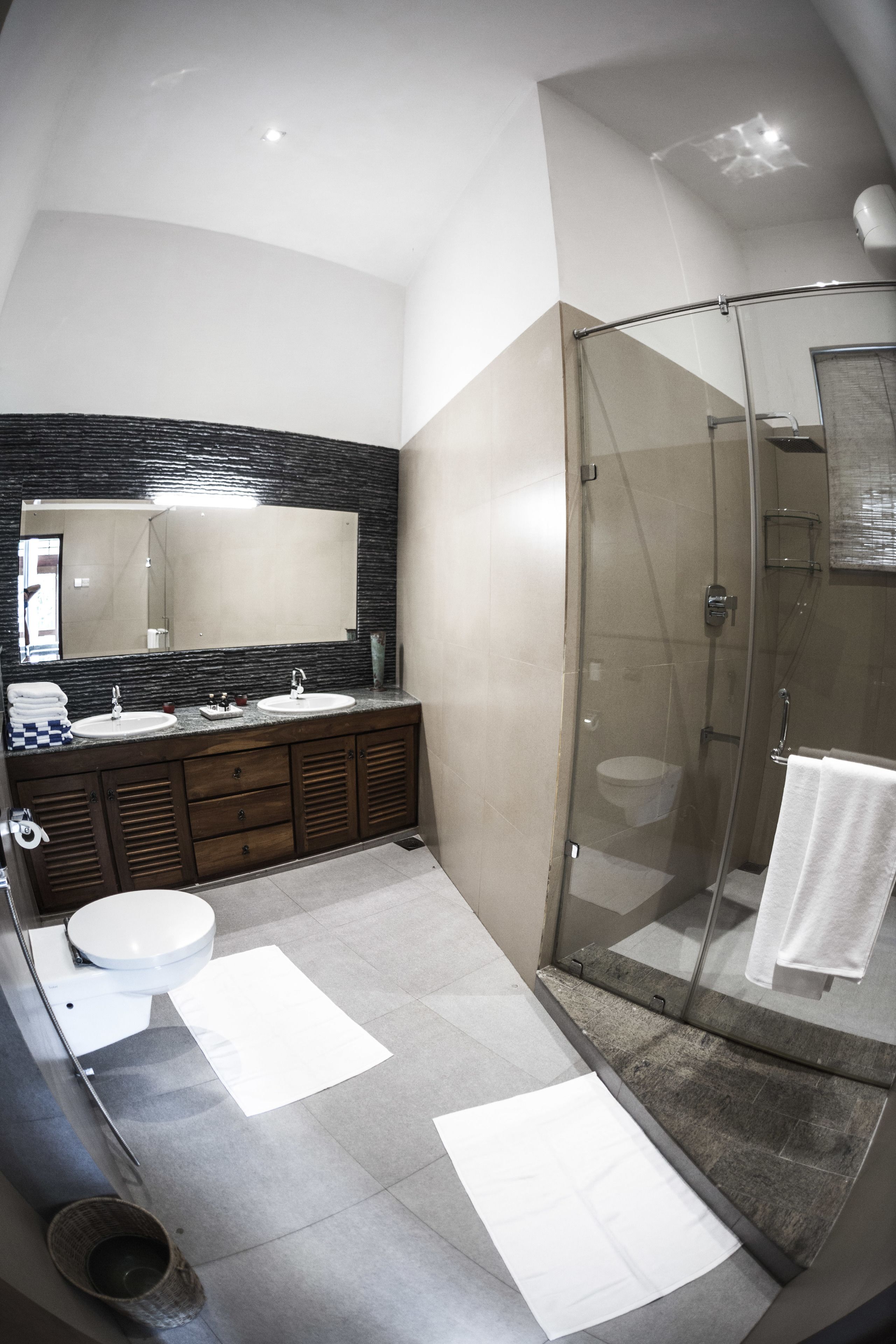 deluxe suite | bathroom | shower, rainfall showerhead, free toiletries, hair dryer