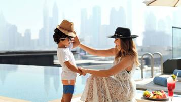 Outdoor pool, open 7:00 AM to 6:00 PM, sun loungers