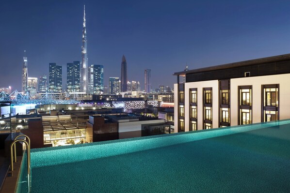 Outdoor pool, open 7:00 AM to 6:00 PM, pool loungers - La Ville Hotel & Suites CITY WALK, Dubai, Autograph Collection (Dubai)