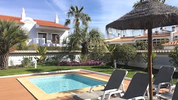 Outdoor pool, open 10:00 AM to 6:00 PM, pool umbrellas, sun loungers