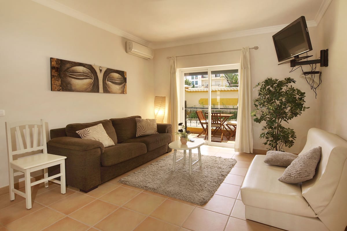 Classic Apartment, 2 Bedrooms | Living room | Flat-screen TV, DVD player