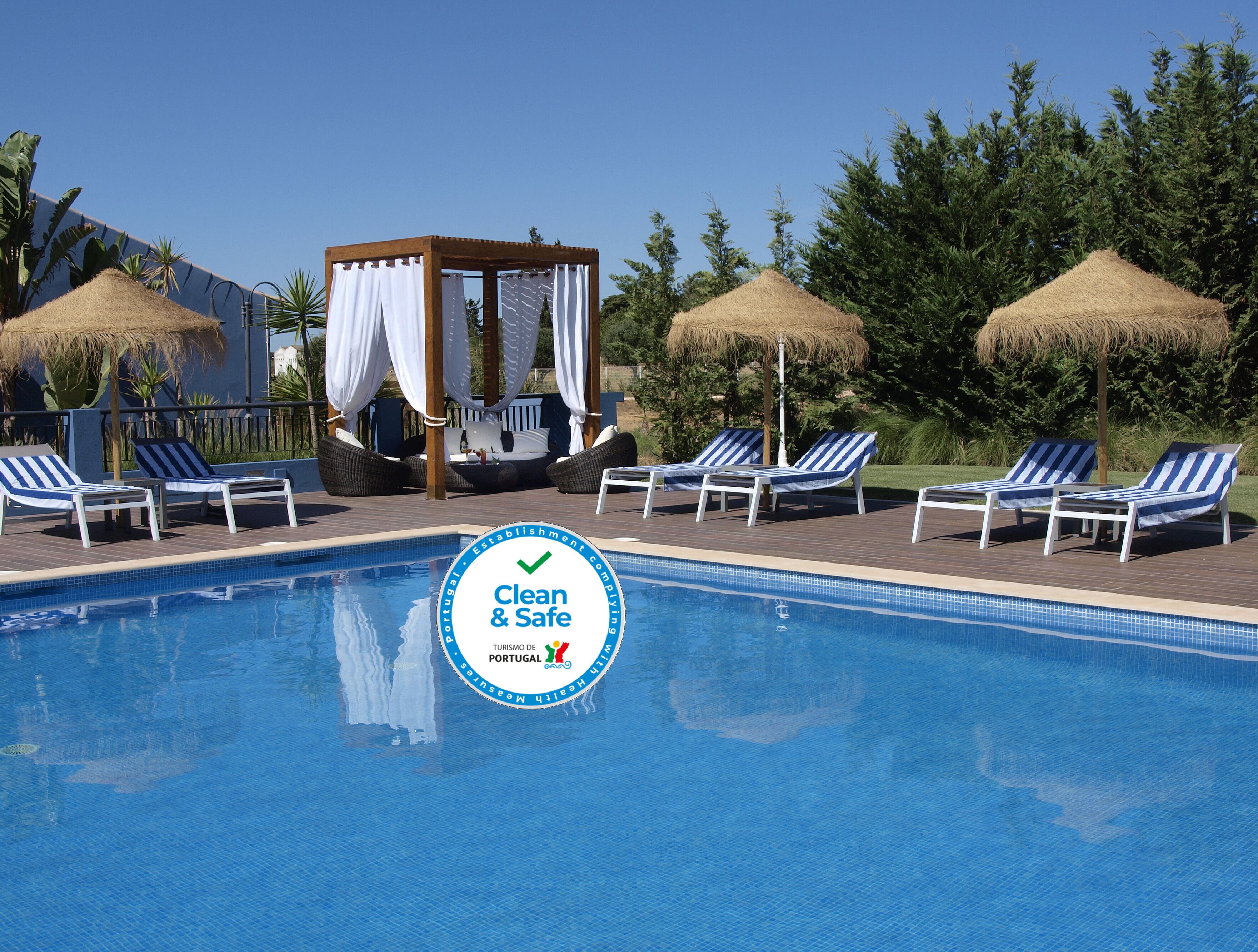 Outdoor pool, pool umbrellas, pool loungers