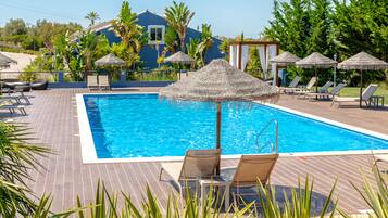 Outdoor pool, pool umbrellas, sun loungers