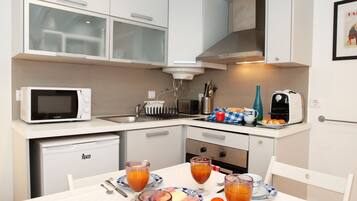 Superior Duplex, Balcony | Private kitchenette | Full-size fridge, microwave, stovetop, coffee/tea maker