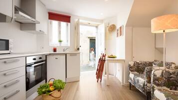 Studio | Private kitchenette | Full-size fridge, microwave, stovetop, coffee/tea maker