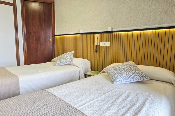 Double room, Private Sink and Shower | Down comforters, Select Comfort beds, desk, laptop workspace
